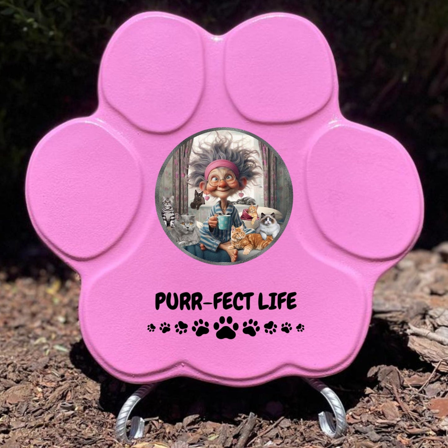 Huella de piedra 'Purr-fect Life' en color rosa, tamaño grande, con soporte para decoración de jardín o hogar.

